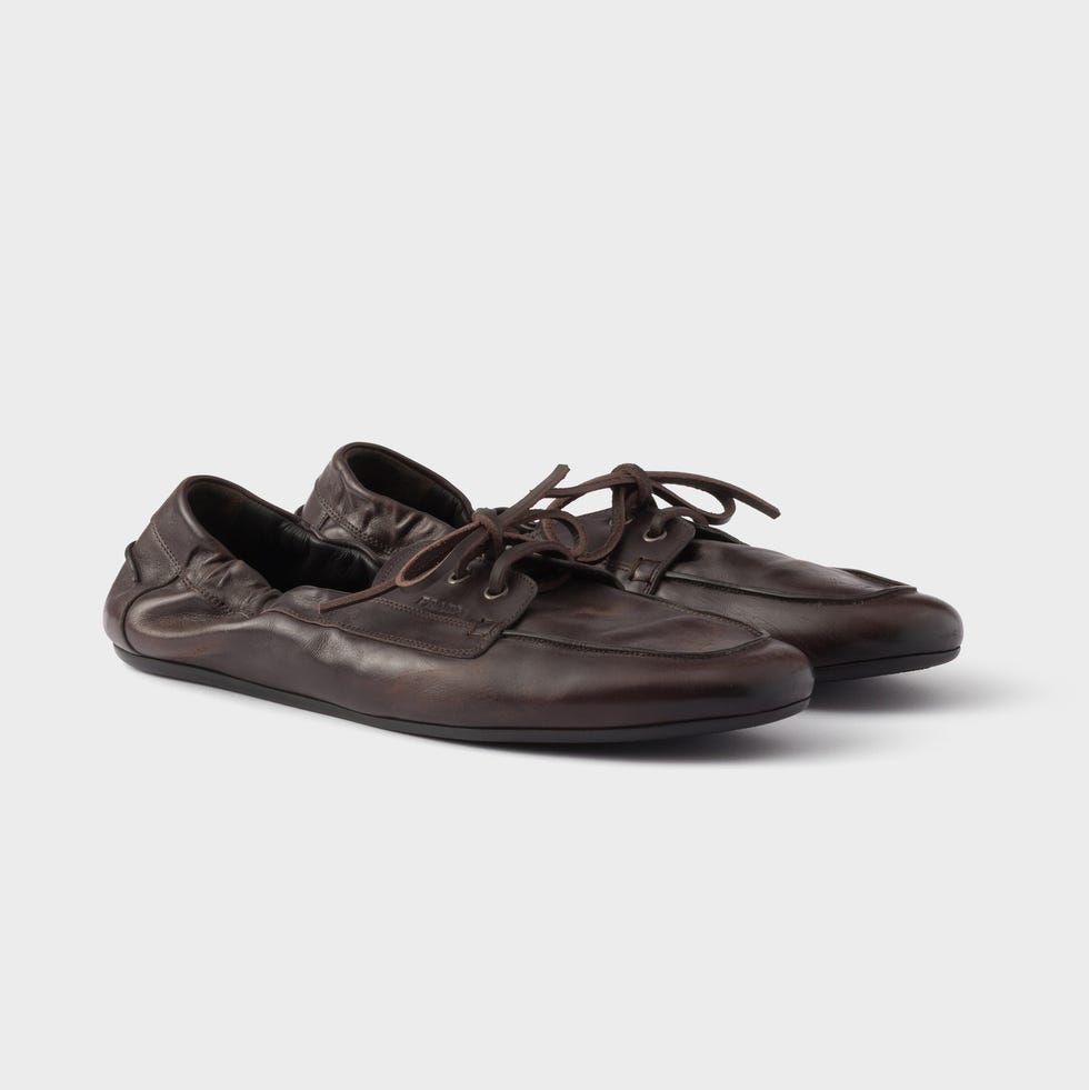 Prada boty Harryho Stylese